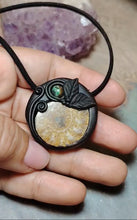 Load and play video in Gallery viewer, PREORDER Golden Ratio. Sacred Geometry Art Jewelry | Ammonite &amp; Turquoise Pendant | Fibonacci Sequence Necklace with Healing Crystals
